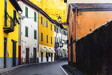 View of narrow street in old town of Barga, Tuscany, Italy