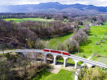 Aerial view of train on viaduct