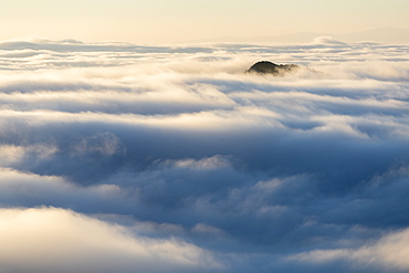 Scenic view of mountain peak among clouds, Cheile Rametului, Alba County, Romania