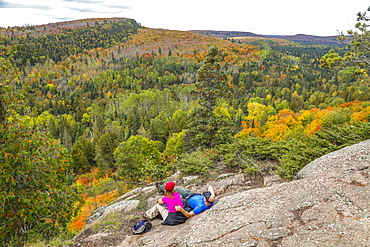 Scenery with forest and hikers at Oberg Mountain hiking trail, Tofte, Minnesota, USA