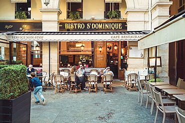 Front view of cafe at University street in Paris, Ile-de-France, France