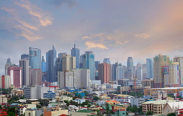 Modern cityscape with skyscrapers at sunset, Makati, Manila, Philippines