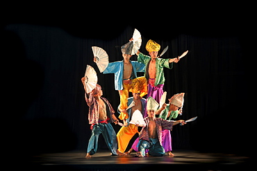 Group of Muslim dancers with fans and swords on stage, Villa Escudero, Manila, Laguna, Luzon Island, Philippines