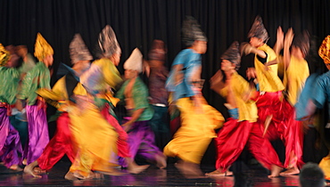 Large group of Muslim dancers on stage, Villa Escudero, Manila, Laguna, Luzon Island, Philippines