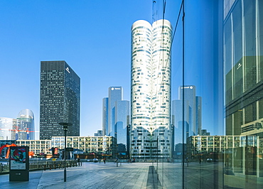 Modern architecture and towers, skyscrapers in La Defense. La Defense is a major business district, three kilometers west of the city limits of Paris, France