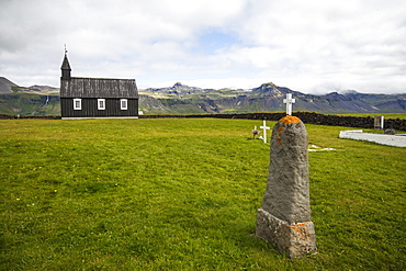 The Budakirkja, commonly known as Iceland's Black Church, is a landmark in the town of Budir on the Snaeffelsnes Peninsula, Iceland