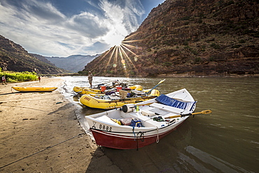 Boats line the shore during a Green river rafting trip, Desolation/Gray Canyon section, Utah, USA