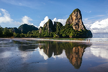 Railay Beach near Krabi, Thailand offers pristine ocean views on the Andaman Sea. The beach is a popular tourist destination located east of Phuket.