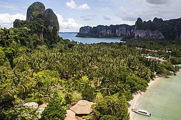 Railay Beach is a popular tourist destination near Krabi, Thailand on the Andaman Sea. Accessible only by boat, the beach includes a number of high end resorts for tourists from around the world.