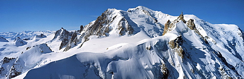 Panoramic of high mountain peaks in the Alps.