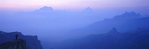 Panoramic of high mountain peaks in the Alps.