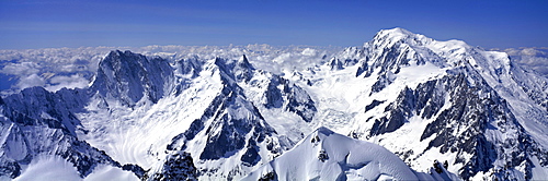 Panoramic of high mountain peaks in the Alps.