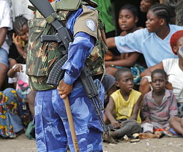 Football game in West point, Monrovia, Liberia.  All female Peacekeeping police force from India are part of the UN's Form Police Unit which provides backup on patrol for local unarmed Liberian National Police  .