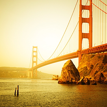 The Golden Gate Bridge from the Golden Gate National Recreation Area, Marin County, California. Tinted yellow.