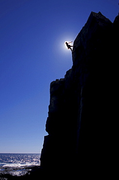 Climber rappelling at Acadia National Park