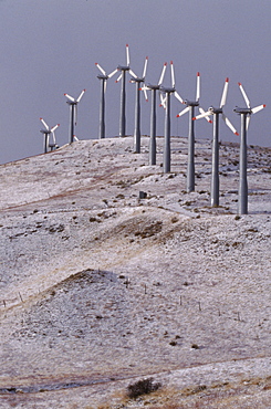 Hightech windmills, some standing 500 feet high when their blades are vertical, hum on the Altamont Pass of California as they produce clean electricity.