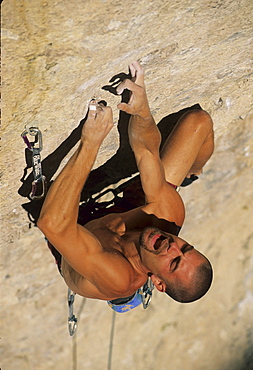 Joe Brooks climbs Legend of the Overfiend at Nevada's Mount Charleston outside Las Vegas. It is one of the premier sport climbing limestone cliffs in the United States with some of the toughest routes.