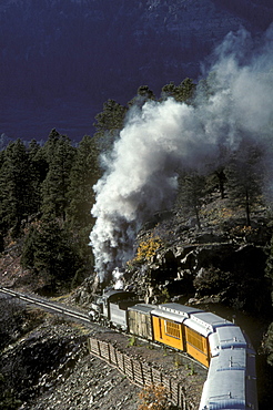 Coal-fired, steam-powered locomotive of the Durango & Silverton Narrow Gauge Railroad on the tracks between Silverton and Durango, Colorado.