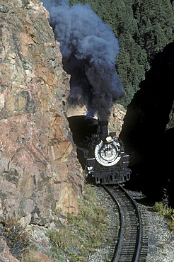 Coal-fired, steam-powered locomotives of the Durango & Silverton Narrow Gauge Railroad on the tracks between Durango and Silverton, Colorado