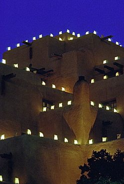 Farolitos adorn the Inn at Loretto in Santa Fe, lighting the way for the Christ Child.