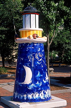 Painted lighthouse sculpture in downtown Portland, Maine