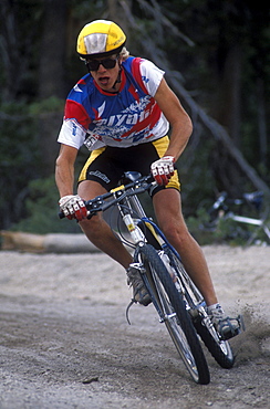 Well known racer, Greg Herbold, races in a 1988 Mountain Bicycle Championships held in Mammoth, California.