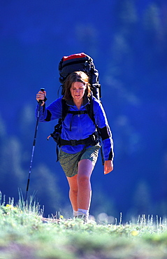 Kathryn Lessey hikes, backpacks in up hill at Kirkwood, California. Kirkwood is considered part of the Lake Tahoe region.