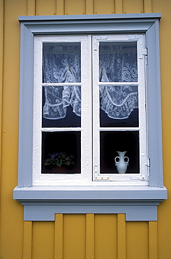 Window on an historic building at Glaumbaer, northcentral Iceland. An important discovery was made in Glaumbaer in 2001: the homestead of Thorfinn Karlsefni, the father of the first European born in the New World. This find has important implications for Viking history.