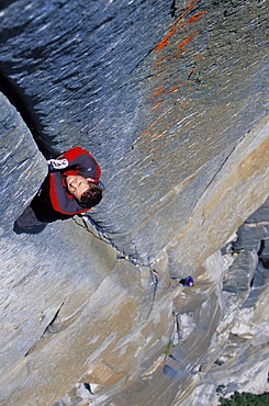 Tommy Caldwell rock climbs a crack on the headwall of The Salathe Wall 5.13 on El Capitan in Yosemite National Park, California. Caldwell is a professional rock climber and has free climbed more on El Capitan than any other climber.