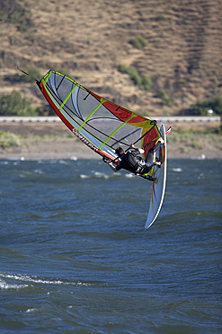 Mark Anderson showing reslove as he completes a back loop on the Columbia River near Maryhill, WA