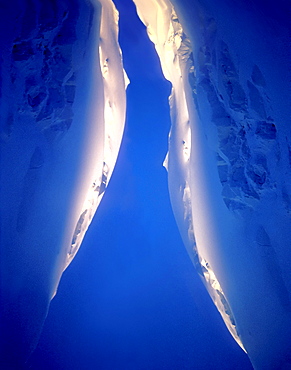 A composite photo of two views of a snowy ridge lit by the Alaskan midnite sun on May 15, 1990.  The ridges are on the West Butress of Denali (Mt. McKinley). (Photo by Kevin Steele, Aurora)