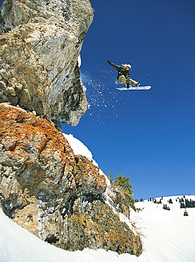 Joe Curtes jumps a cliff in Vail Colorado's Back Bowls