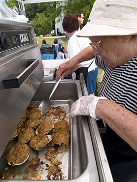 Warren, RI, 7, 16, 05: Vendors unpack, bake and sell premade stuffed Quahogs as part of the Warren Quahog festival (a community fundraiser) in Warren, Rhode Island.