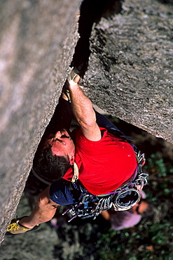 Bill Saul jams the strenuous crack called "Oh My God Corner" (5.10+) at the God Crags on Old Rag Mountain in the Shenandoah National Park, VA