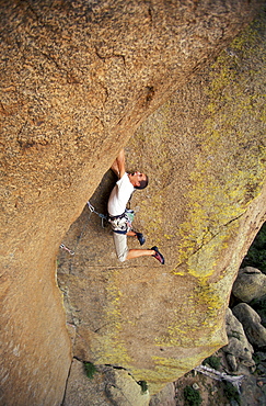 Justin Bastien lead climbs an overhanging 5.11 climbing route at the Vedauwoo climbing area in Medicine Bow National Forest, Wyoming. Vedauwoo is believed to mean "Land of the Earthborn Spirits" in Arapahoe.