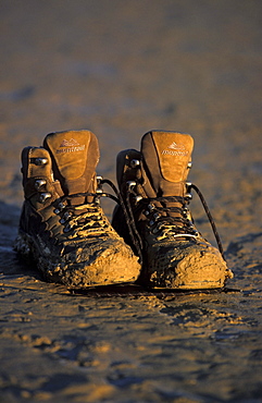 A pair of muddy boots sit out to dry in Death Valley National park in eastern California.