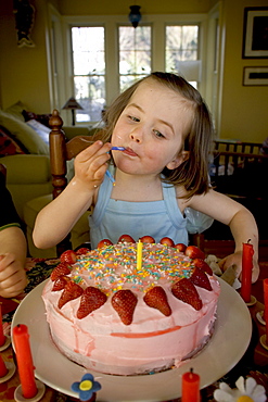 A young girl celebrates her 4th birthday at her home in Yarmouth, Maine.