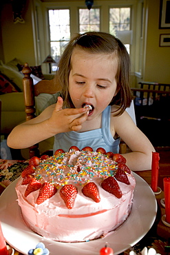 A young girl celebrates her 4th birthday at her home in Yarmouth, Maine.