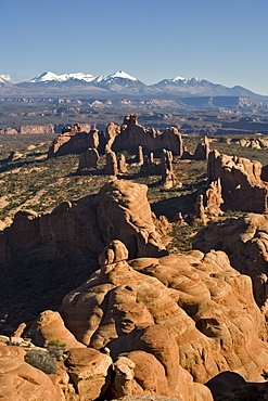 Rock formations and mountains in Arches National Park, Moab, Utah.