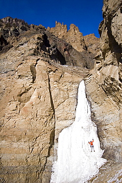 Man ice climbing, Wyoming