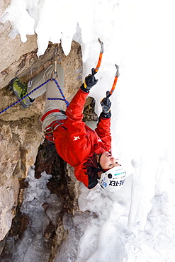 Woman ice climbing, Colorado