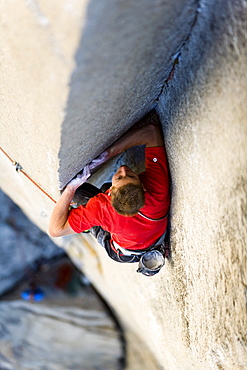 Male free climbing