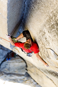 Male free climbing