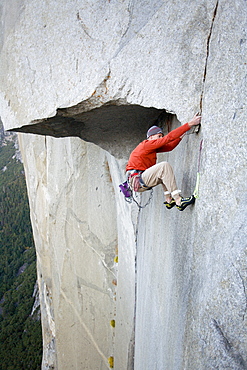 Male free climbing