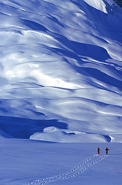 Two people with snow-shoes in the Brevent area, Mont Blanc massif