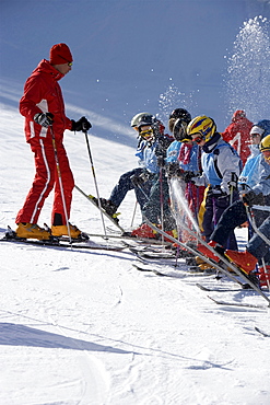 A ski instructor with children.