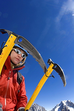 A climber with two ice axes