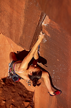 woman rock climbing, Utah