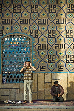 Adult Muslim man praying in the Al Nabi Mosque, Qazvin, Iran