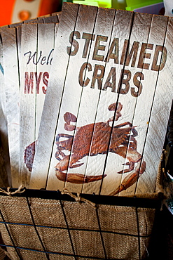 ROCKPORT, TEXAS, USA. A detail image of a sign that says "Steamed Crabs"